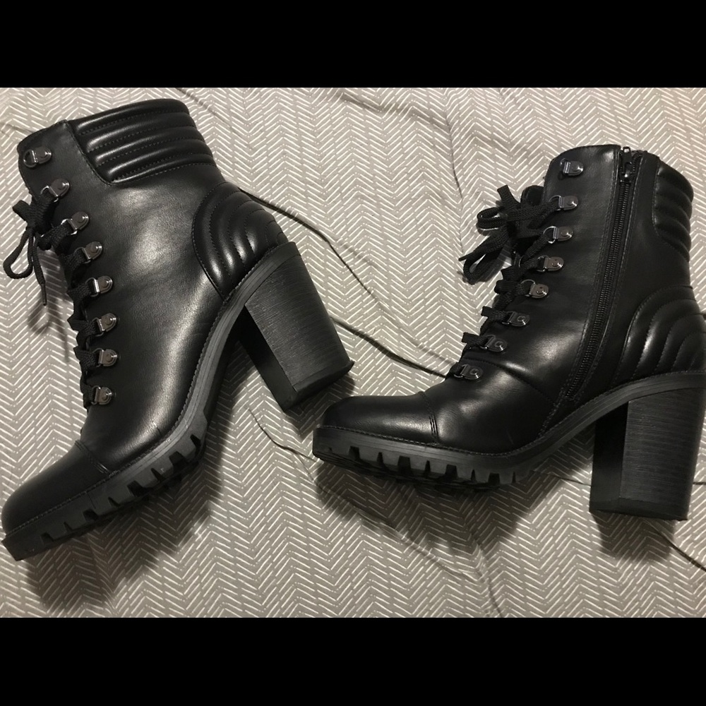 Slightly worn Guess boots.